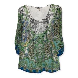 Women’s quarter series blouse size medium